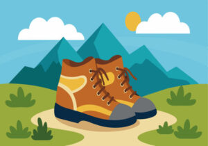 230286169 une paire de bottes de randonnée marron se trouve sur un chemin devant une montagne les bottes sont
